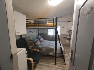 a small room with a bunk bed in a room at la PASSERONNE in Barbentane +26 photos