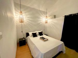 En eller flere senger på et rom på Lovely Apartment in Flic-en-Flac