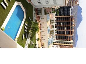 an overhead view of a building with a pool at Ballesol Costablanca Senior Resort mayores de 55 años in Cala de Finestrat