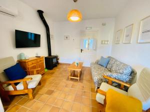 Posezení v ubytování Stay Wild en Las Casitas de Huerta Arriba