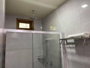 Koupelna v ubytování Endhaa, Divers Home