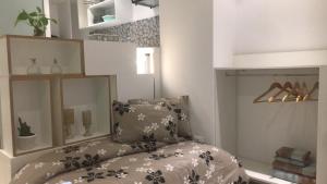 Letto o letti in una camera di Charmant studio à Sfax