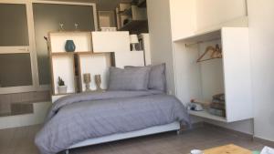 Letto o letti in una camera di Charmant studio à Sfax