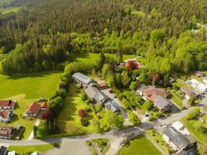 an aerial view of a house in a forest at WAGNERS Hotel im Fichtelgebirge in Warmensteinach