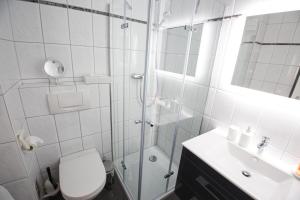 Koupelna v ubytování Kajüte 24 + 19 fotografií