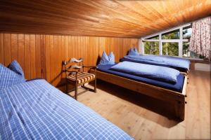 Una cama o camas en una habitación de Beautiful cosy House near Königsee