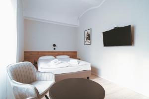 Tempat tidur dalam kamar di Pokoje Venezia