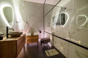 Ένα μπάνιο στο Masarotto Luxury Chalet #1