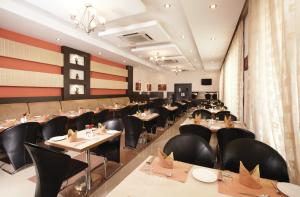A restaurant or other place to eat at Regency Tuticorin by GRT Hotels