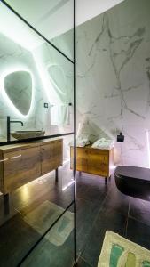 Ένα μπάνιο στο Masarotto Luxury Chalet #1