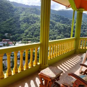 a balcony with a view of the mountains at Mountain Palace in Guarata