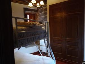Postel nebo postele na pokoji v ubytování Vivienda Turística A Petada de San Clodio