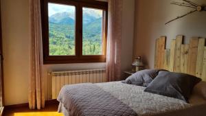 Postel nebo postele na pokoji v ubytování Apartament Vent de Port