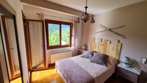 Postel nebo postele na pokoji v ubytování Apartament Vent de Port