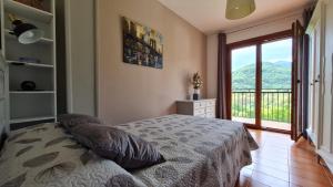 Postel nebo postele na pokoji v ubytování Apartament Vent de Port