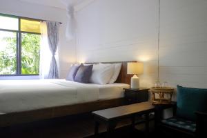 Postel nebo postele na pokoji v ubytování Inn Oon Villa
