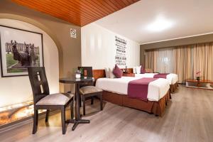 Postel nebo postele na pokoji v ubytování Hotel Andesmar