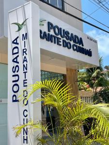 una señal para una pocomadiaannisannis dmg do clinica en Pousada Mirante do Cunhaú en Barra do Cunhau