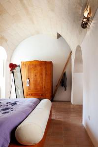 Postel nebo postele na pokoji v ubytování Casa Brunella