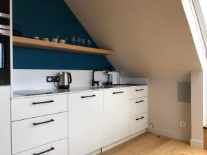Kuchyň nebo kuchyňský kout v ubytování Appartement L'Embarcadère