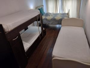 A bed or beds in a room at Casa en Tandil
