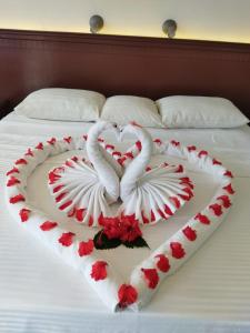 Voodi või voodid majutusasutuse Hotel Puerta Chichen toas