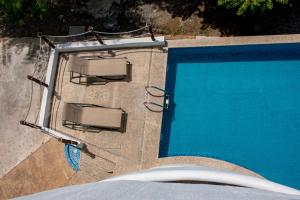 Bazén v ubytování LA LOMA SUITES nebo v jeho okolí