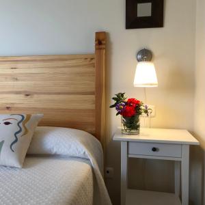 Posteľ alebo postele v izbe v ubytovaní Casa Rural Maria