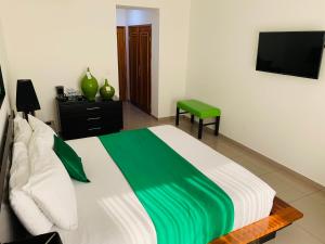 Televisyen dan/atau pusat hiburan di Hotel Galerias HN