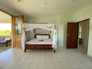 Postel nebo postele na pokoji v ubytování MASKANI Villa + 31 fotografií