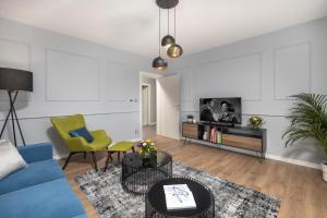 Kuchyň nebo kuchyňský kout v ubytování Blue Allure Apartment