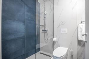 Kúpeľňa v ubytovaní Blue Allure Apartment + 19 fotografií