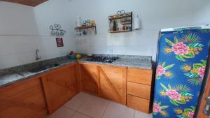 Kuchyň nebo kuchyňský kout v ubytování villa verde corumbau