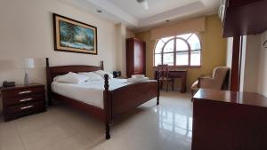 Voodi või voodid majutusasutuse Hotel Voyager Manta toas