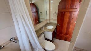 Vannituba majutusasutuses Hotel Voyager Manta
