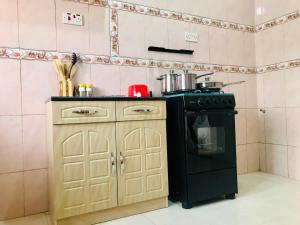 Kuhinja oz. manjša kuhinja v nastanitvi Moroccan Tile House - Tranquil Estate - Boundary Rd