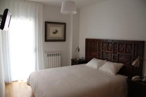 Posteľ alebo postele v izbe v ubytovaní Apartaments Centre Figueres