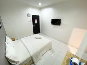 TV a/nebo společenská místnost v ubytování 1108 Hotel Sungkai