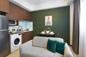 A kitchen or kitchenette at The Initial Residence