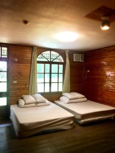 Postel nebo postele na pokoji v ubytování Wan Ruey Resort