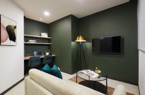 A television and/or entertainment centre at The Initial Residence
