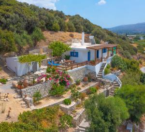 an aerial view of a house on a hill at The Rock & The Lemon Tree in Sitia