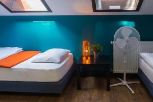 Posteľ alebo postele v izbe v ubytovaní Hello Hostel & Apartments