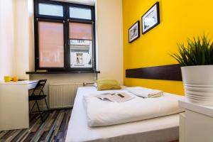 Posteľ alebo postele v izbe v ubytovaní Hello Hostel & Apartments