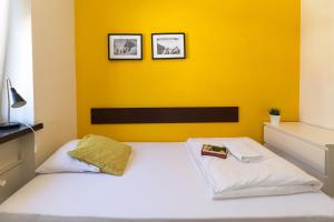 Posteľ alebo postele v izbe v ubytovaní Hello Hostel & Apartments