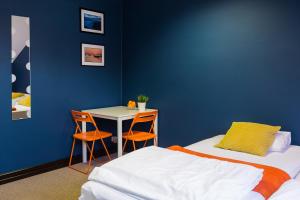 Posteľ alebo postele v izbe v ubytovaní Hello Hostel & Apartments