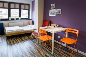 Posteľ alebo postele v izbe v ubytovaní Hello Hostel & Apartments