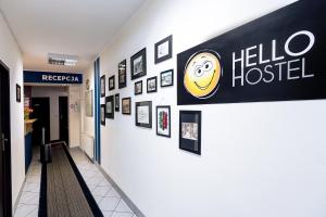a hallway with a hello hospital sign on a wall at Hello Hostel & Apartments in Bielsko-Biala