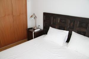 Posteľ alebo postele v izbe v ubytovaní Apartaments Centre Figueres