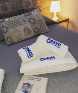 Postel nebo postele na pokoji v ubytování O'Paisi Casa Vacanze